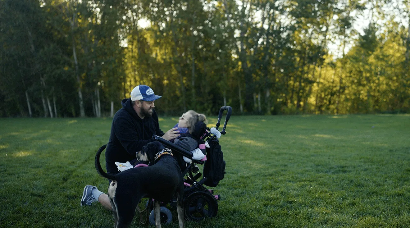 brady crandall with his disabled daughter