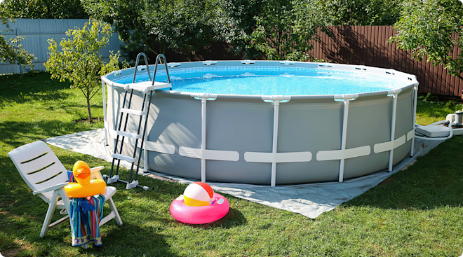 above ground swimming pool in backyard