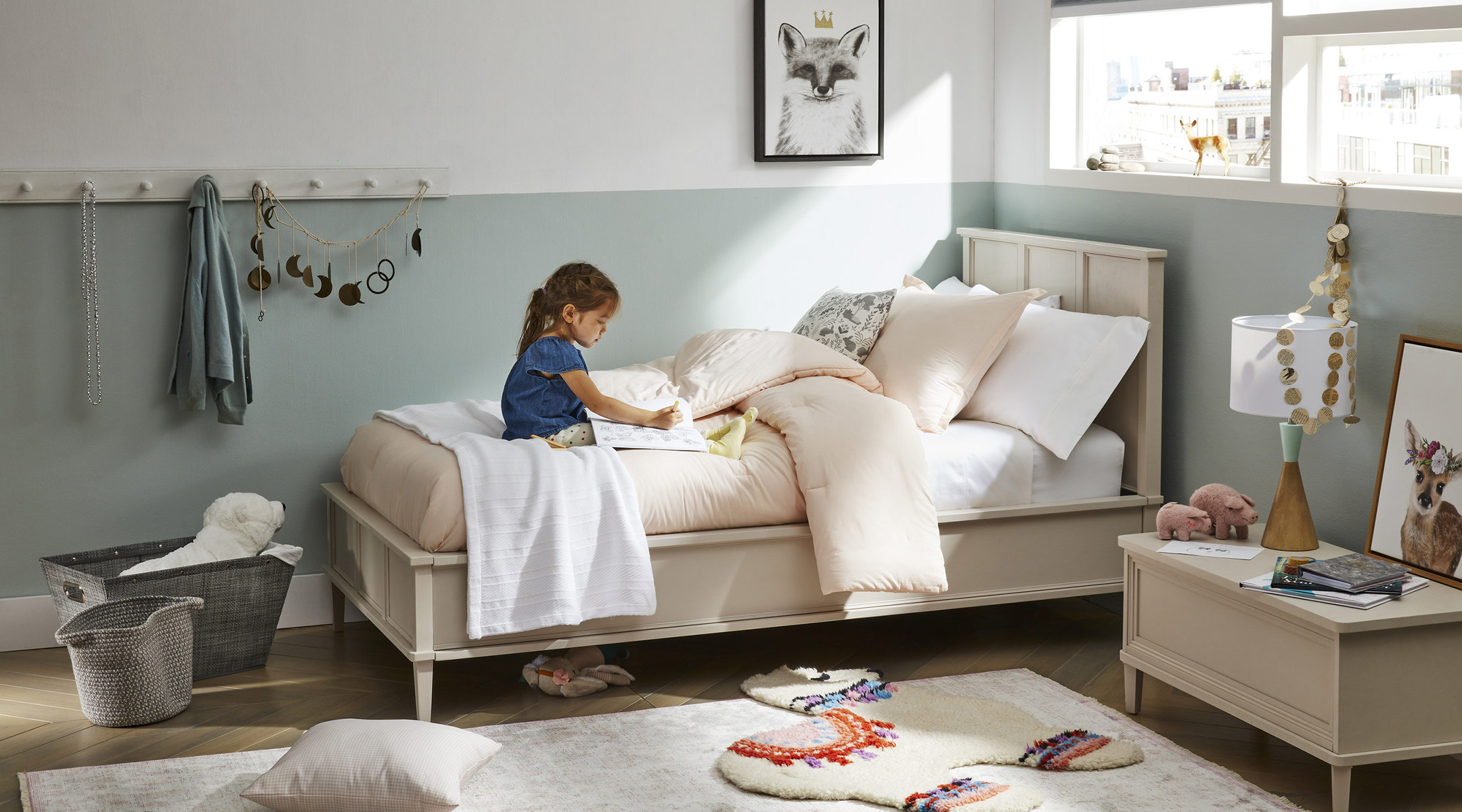 girl playing in her decorated room