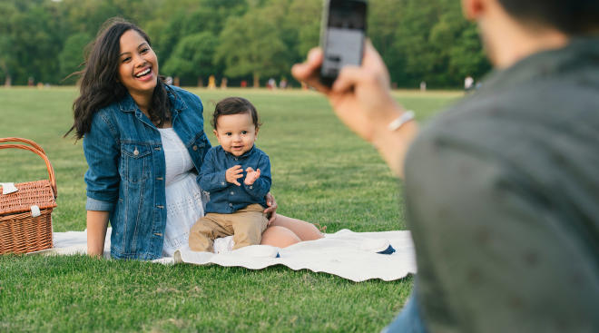 Baby model and happy family in park