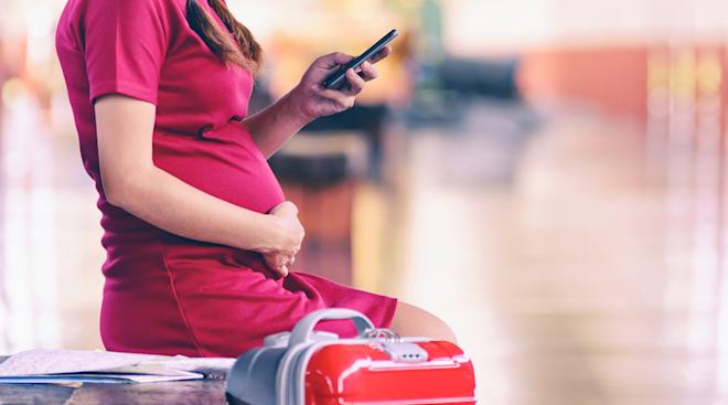 pregnant woman in airport