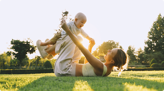 mom and baby playing outside