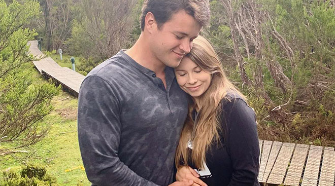 pregnant bindi irwin pictured with her husband outdoors