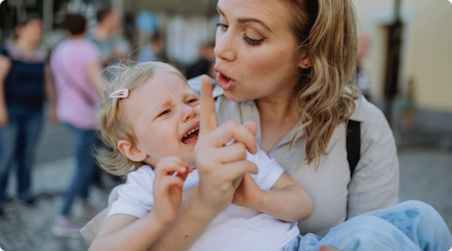 mom disciplining toddler