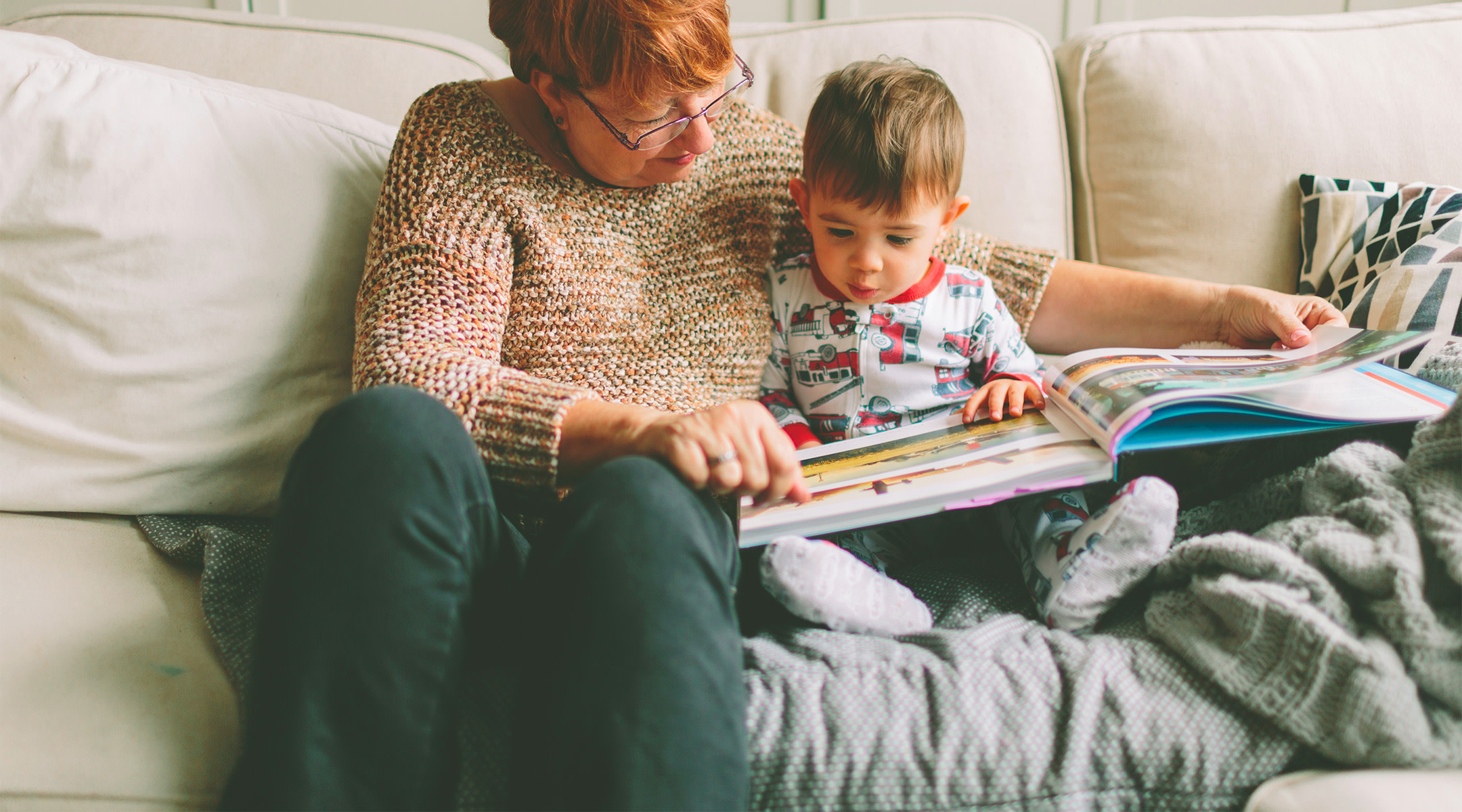 grandma reading children's book quotes to her grandson