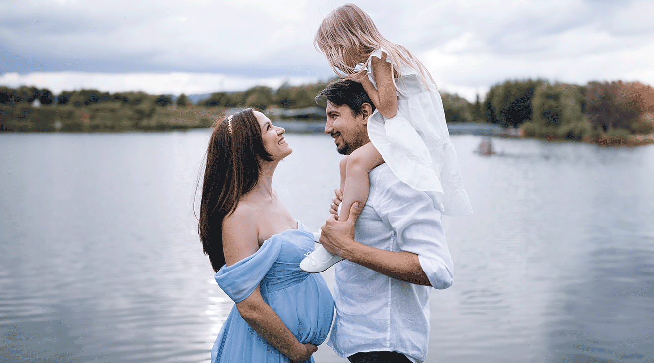 pregnant mom with child and husband