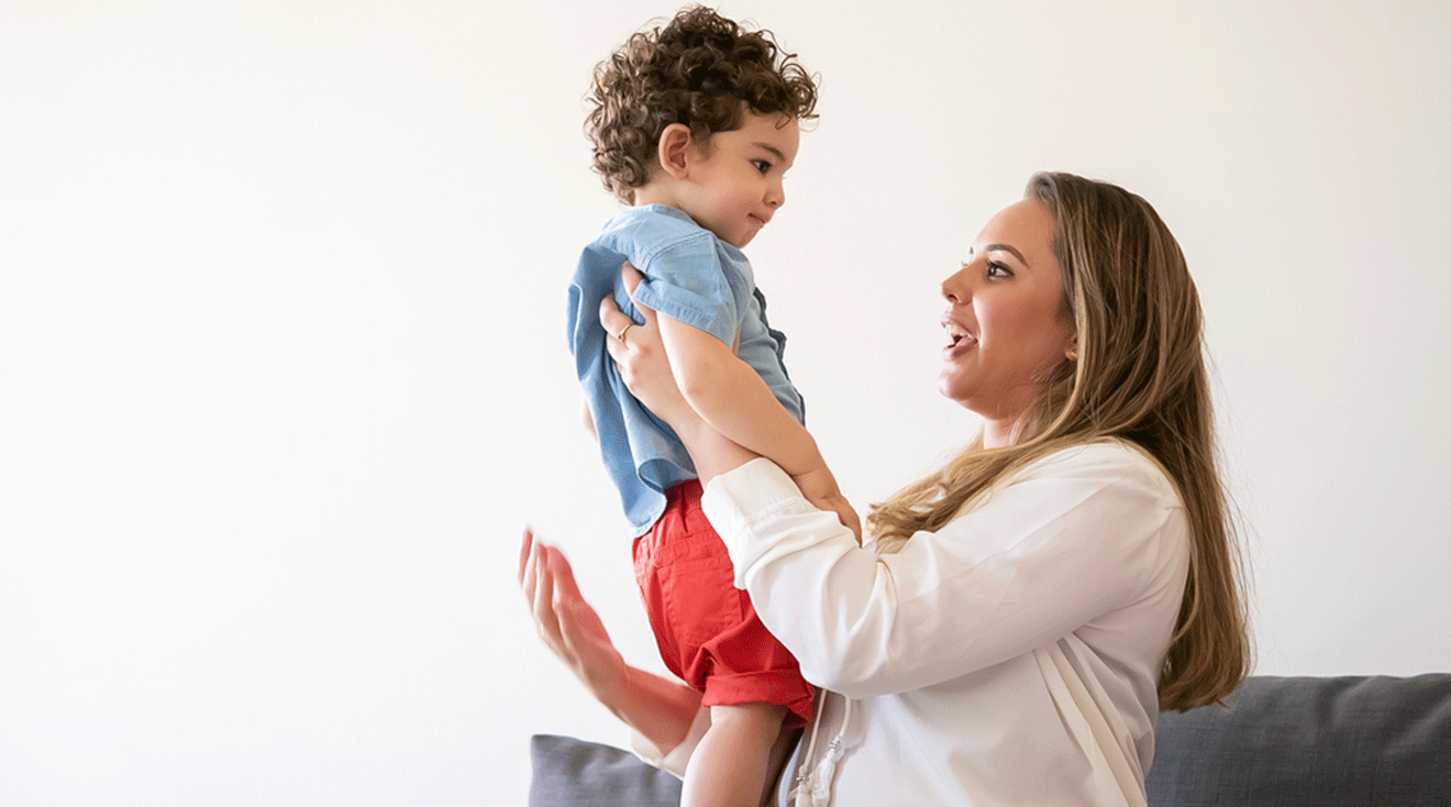 mom talking to toddler son