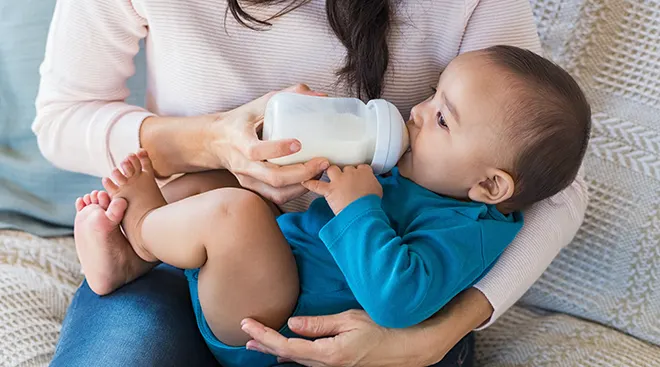 mother feeding baby