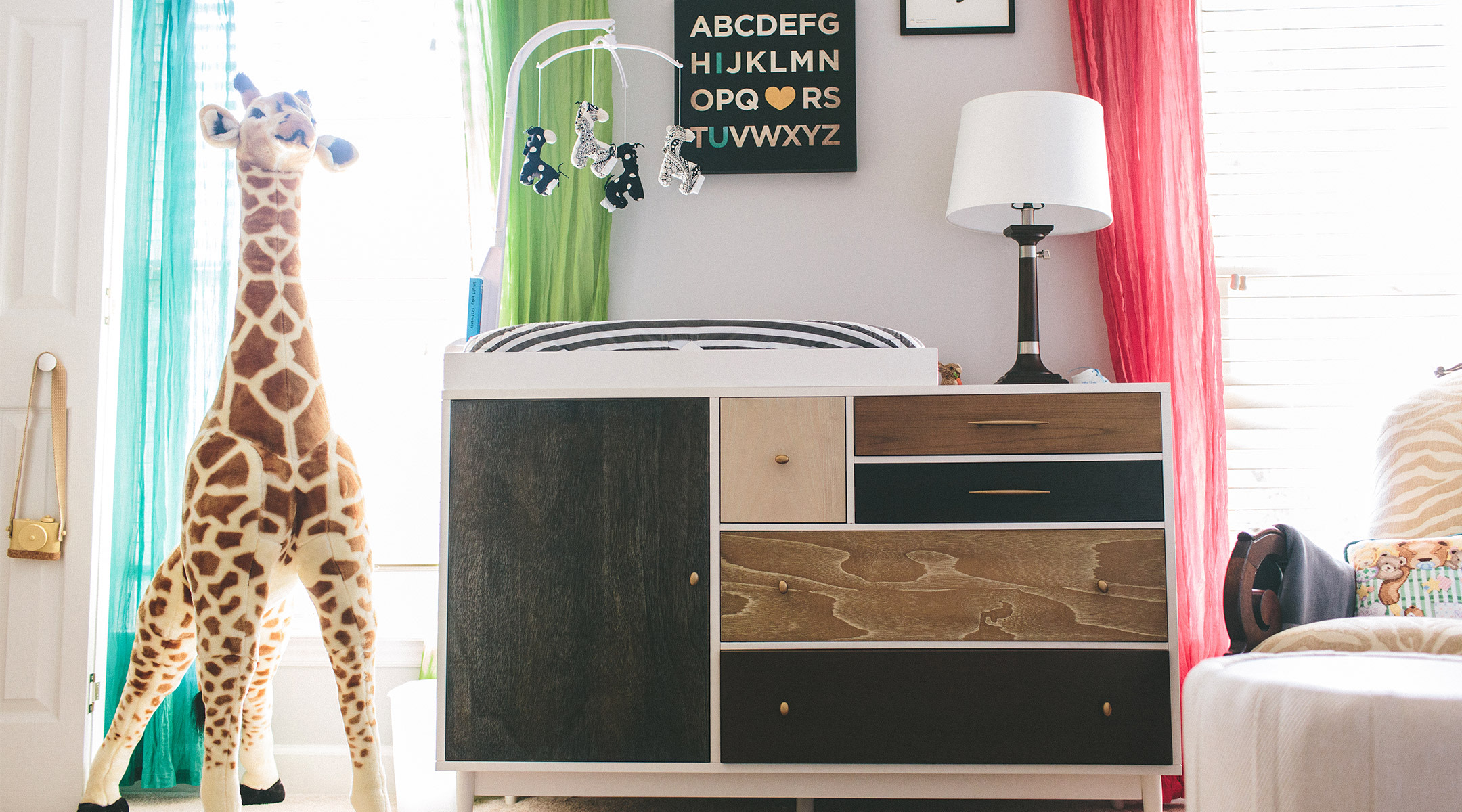 changing table in decorated nursery room