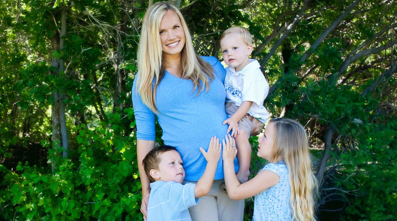 pregnant mom with three children