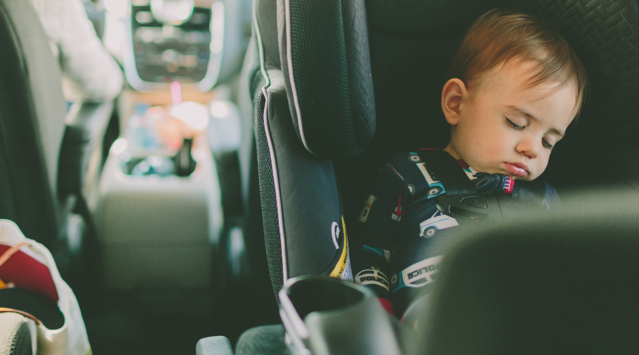 baby sleeping in car seat