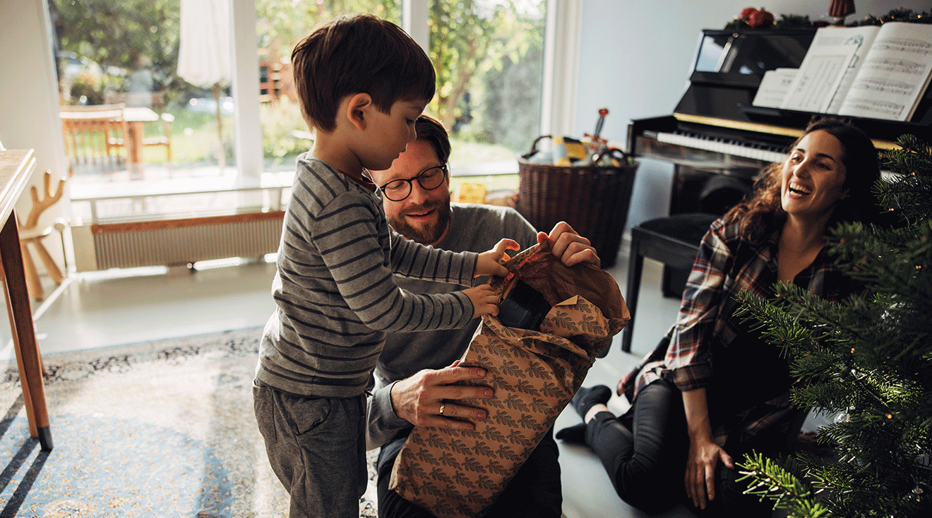 family opening christmas presents