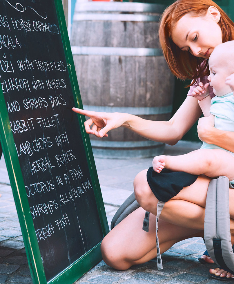 Photo of Family Out to Eat Captures How Isolating Motherhood Can Feel