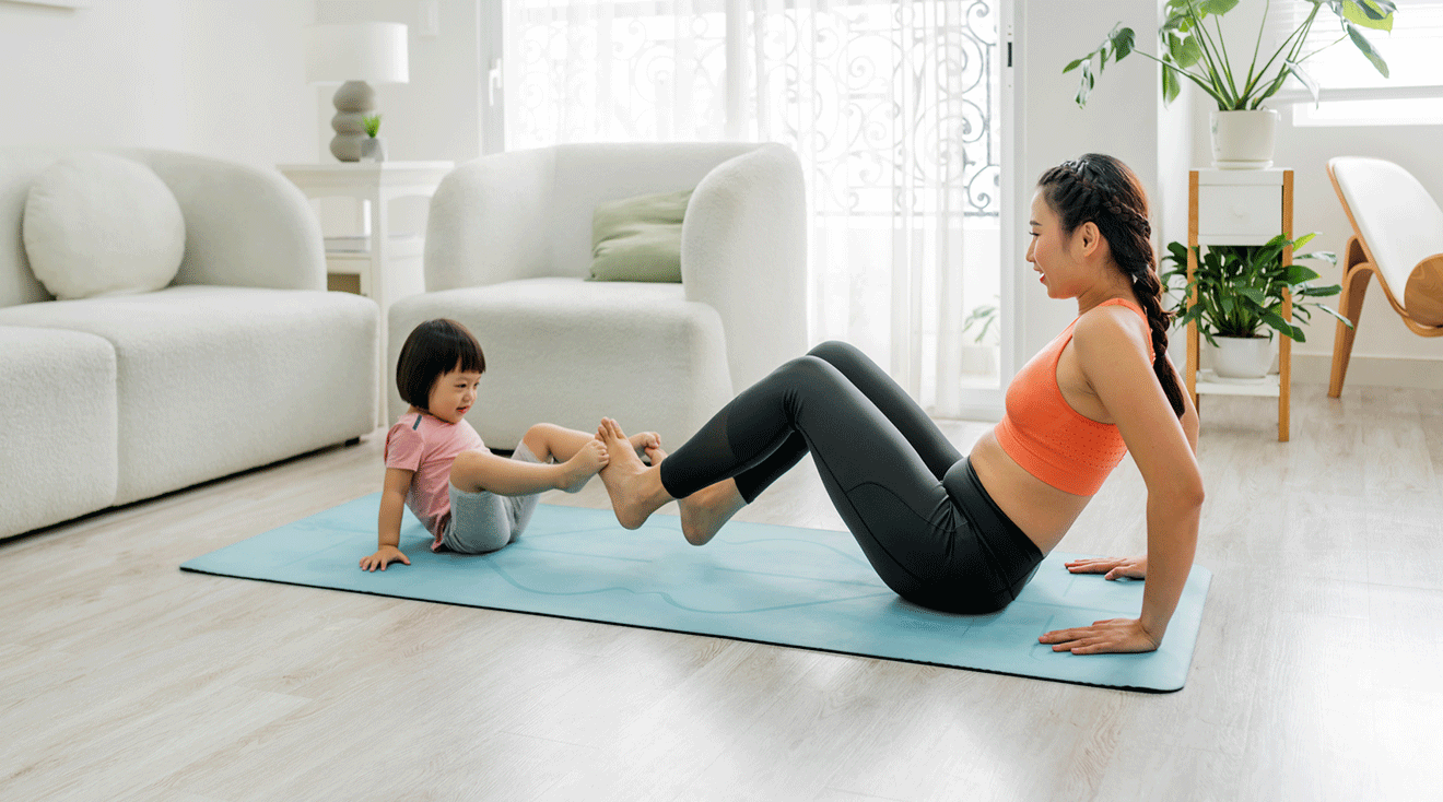 mom and baby exercising at home