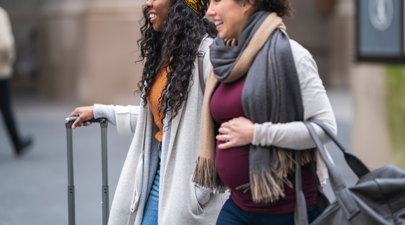 Two women travelling on babymoon