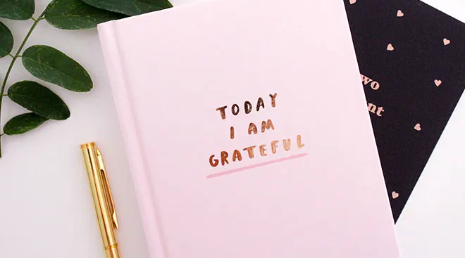 a notebook and a pen