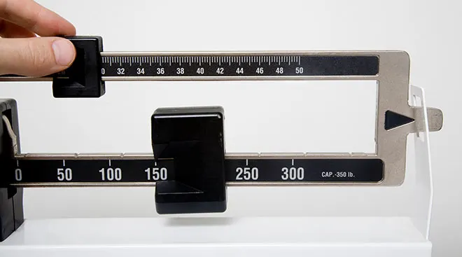 traditional weight scale in doctor's office