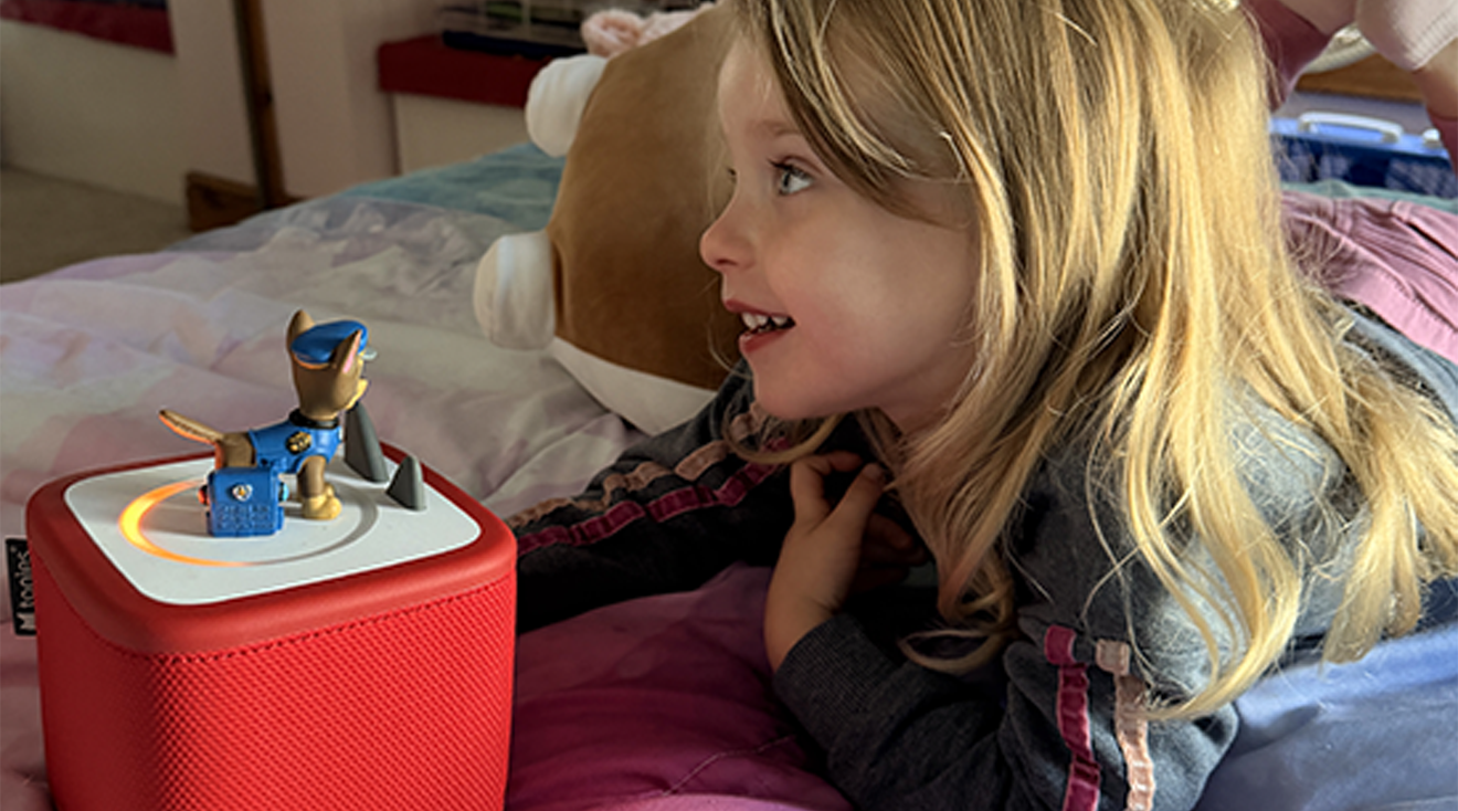 toddler with tonie toy