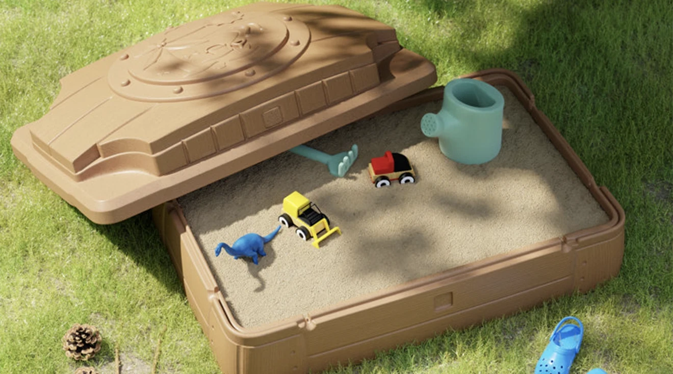 Sandbox with toys and lid