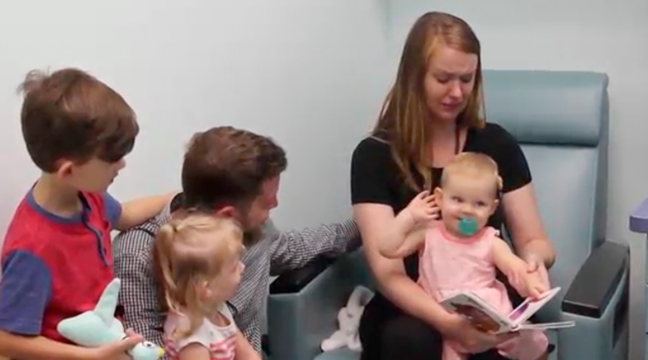 Mom's emotional reaction to baby hearing for the first time.