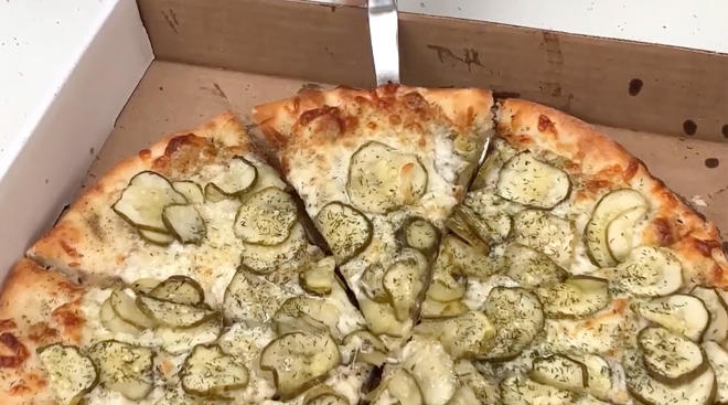 pizza covered in pickle toppings perfect for pregnancy cravings