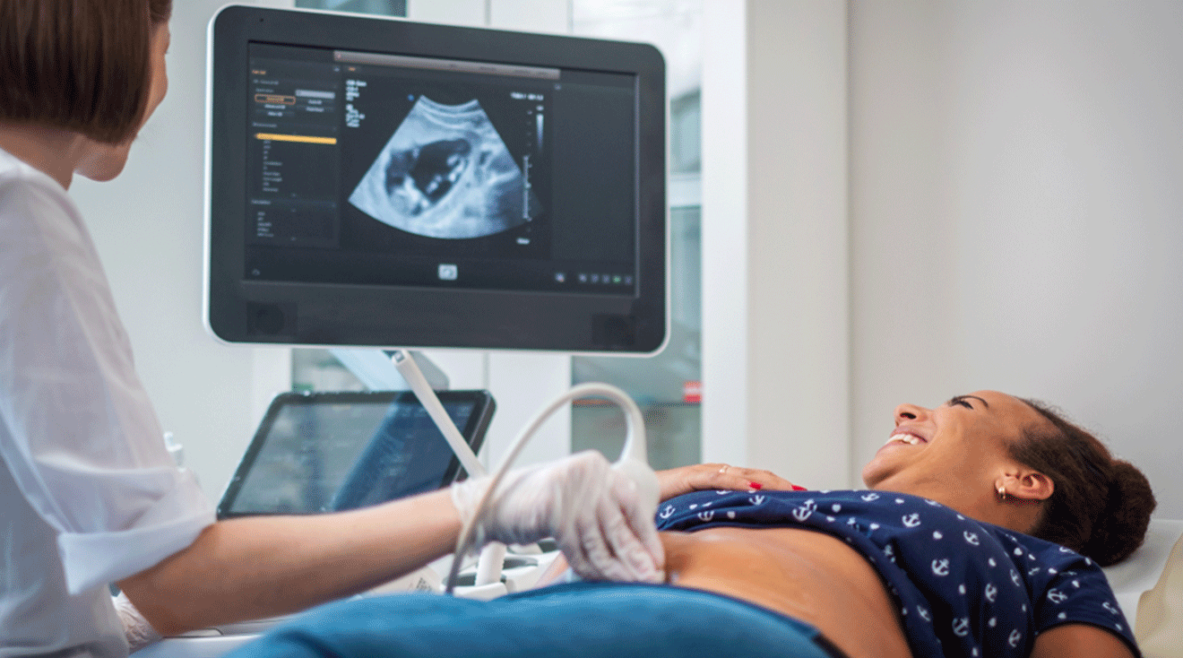 pregnant woman getting an ultrasound at 12 weeks pregnant