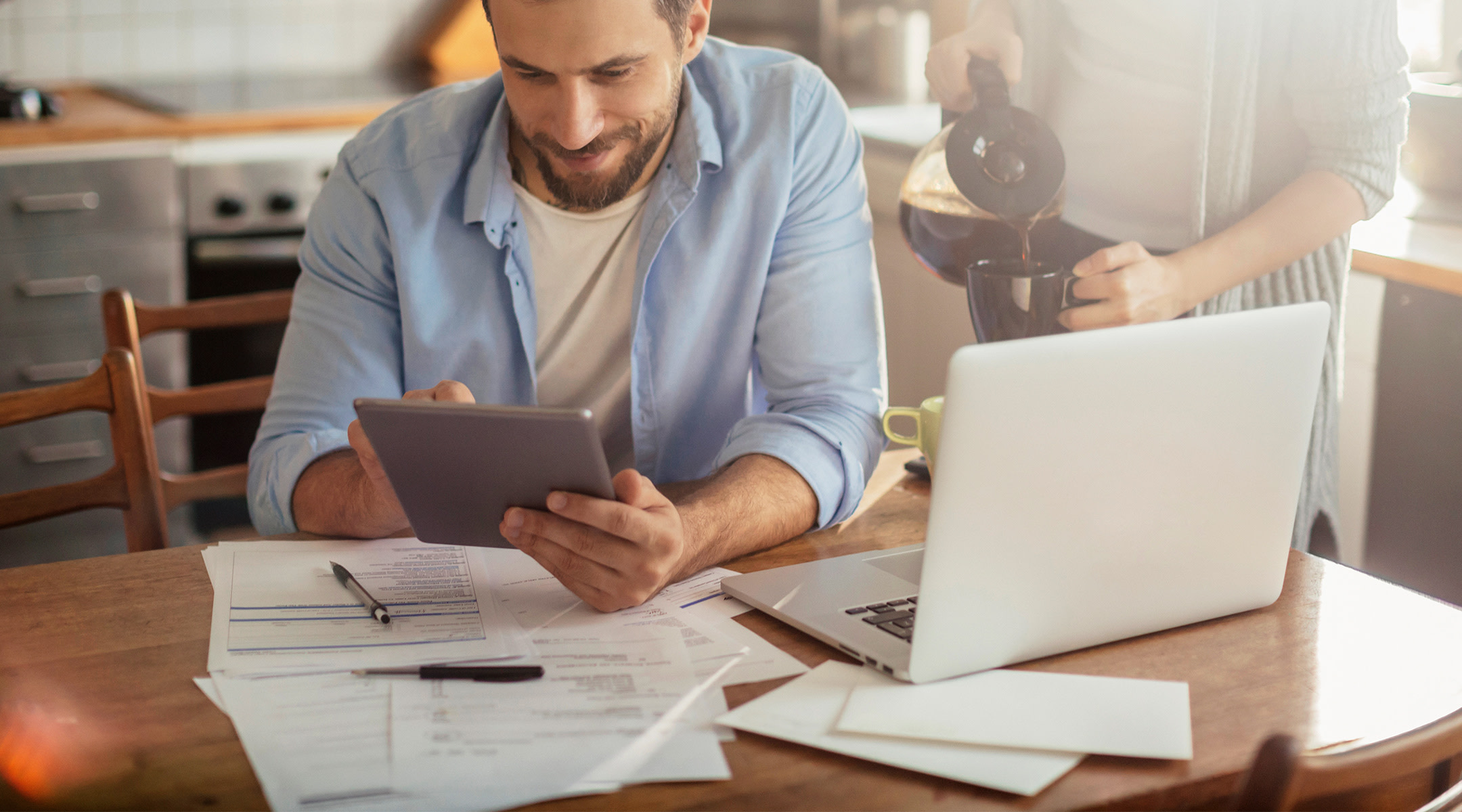 couple at home looking over finances