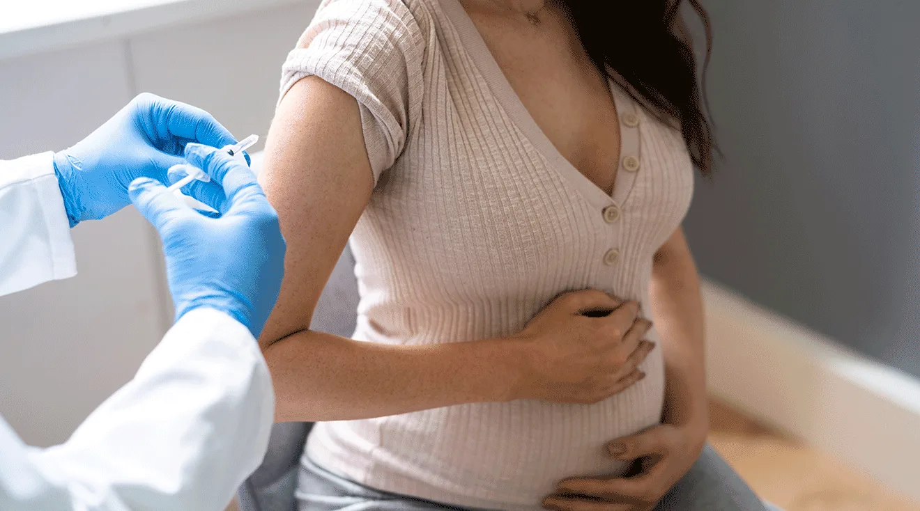 pregnant woman receiving covid-19 vaccine