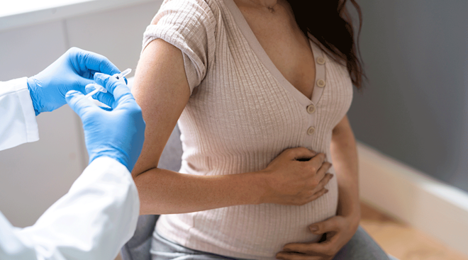 pregnant woman receiving covid-19 vaccine