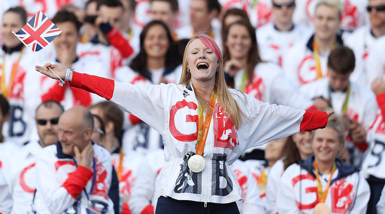 Archer Jodie Grinham celebrates during the Olympics & Paralympics Team GB - Rio 2016 Victory Parade at Trafalgar Square on October 18, 2016 in London, England