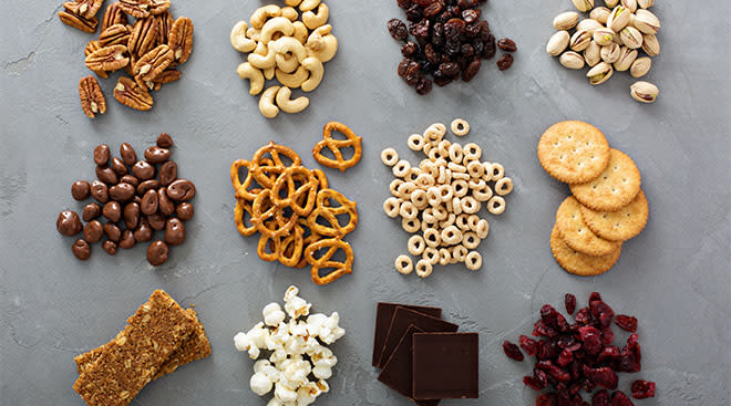 snacks such as nuts, arranged in small piles on surface