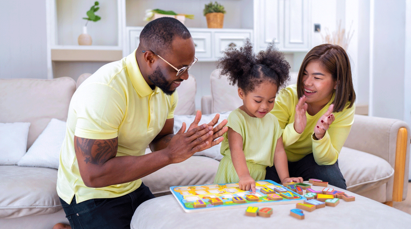 parents teaching toddler ABCs