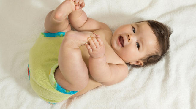 Why Babies Pull Their Legs to Their Chest