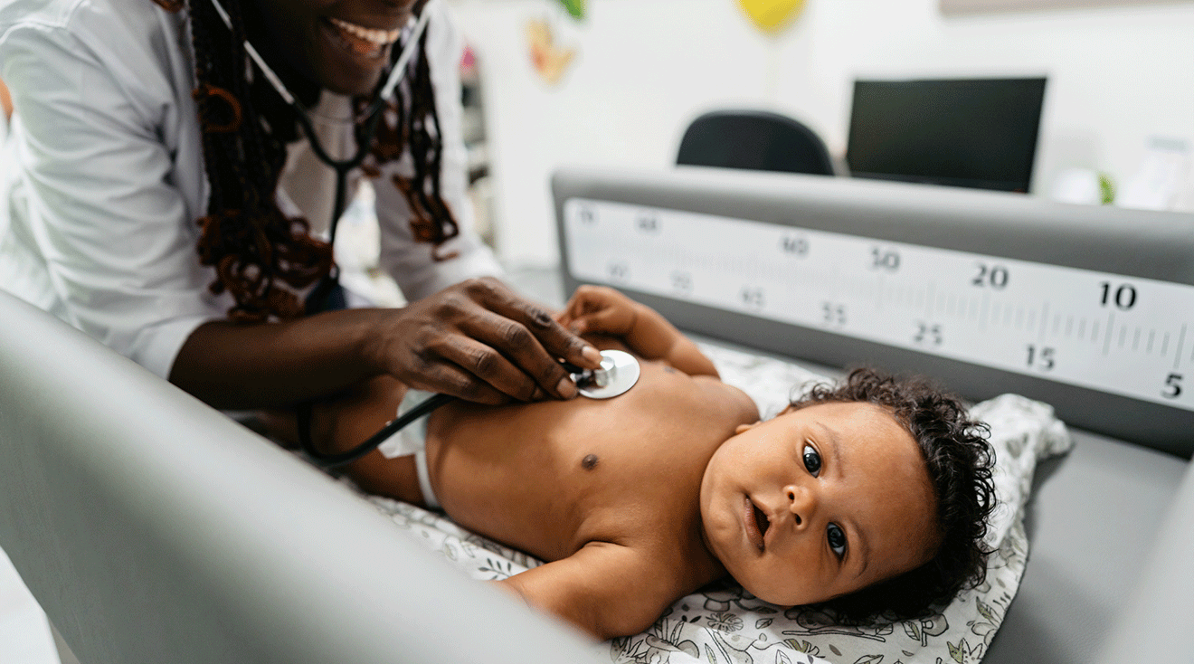 doctor measuring baby