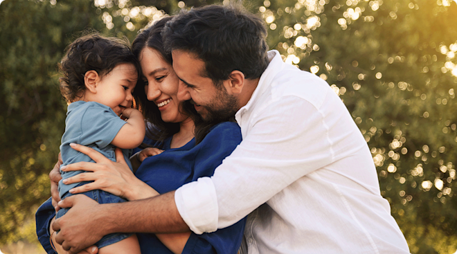 happy mom and dad with baby