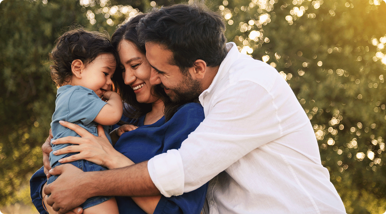 happy mom and dad with baby