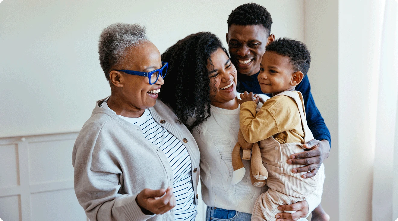 family with toddler and grandma at home