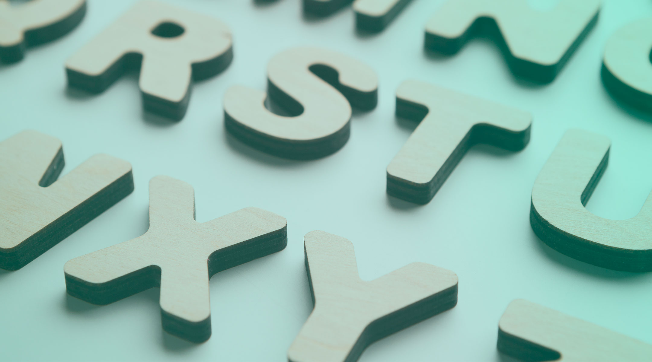 pile of wooden alphabet letters