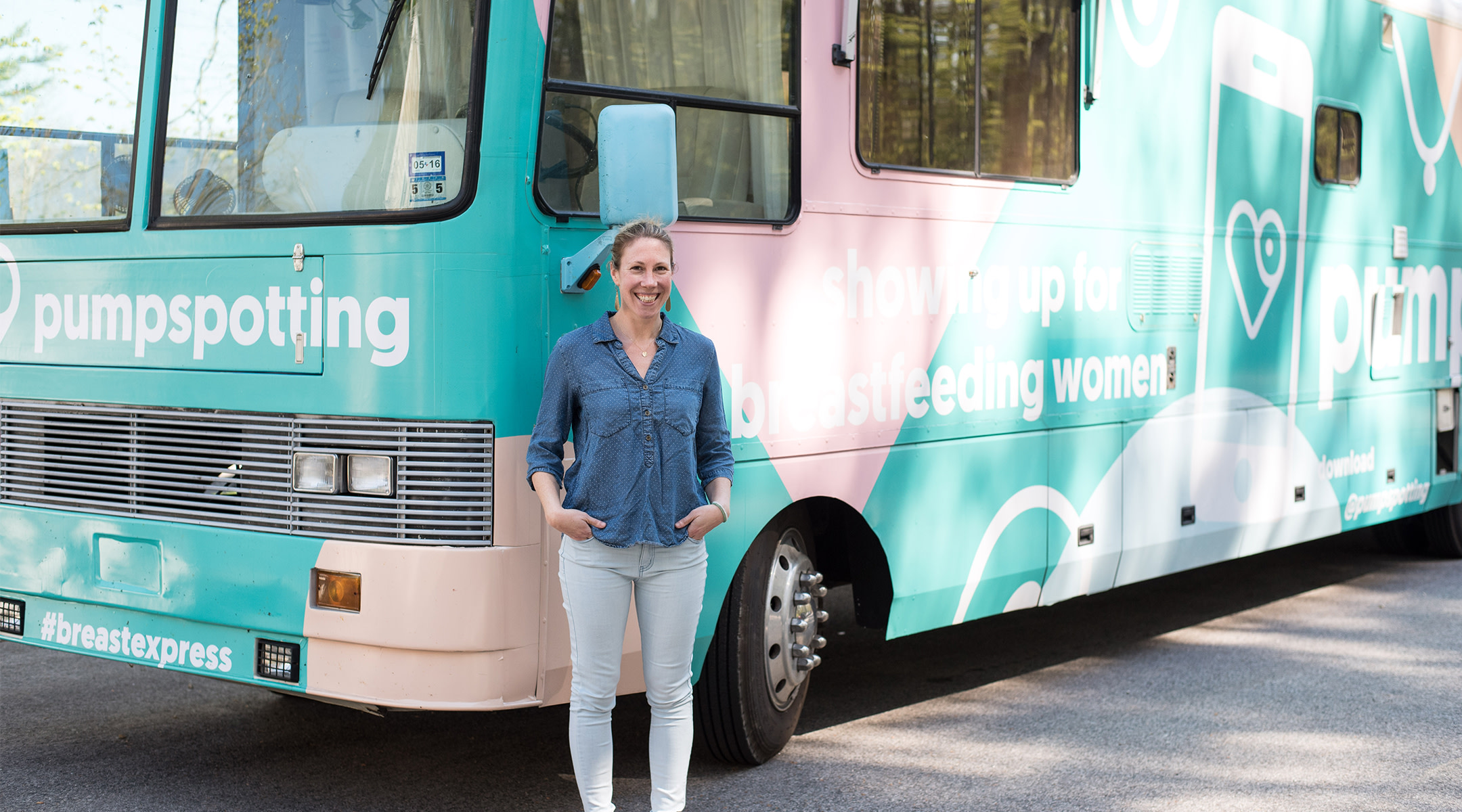 Amy VanHaren in front of a breastfeeding-themed RV