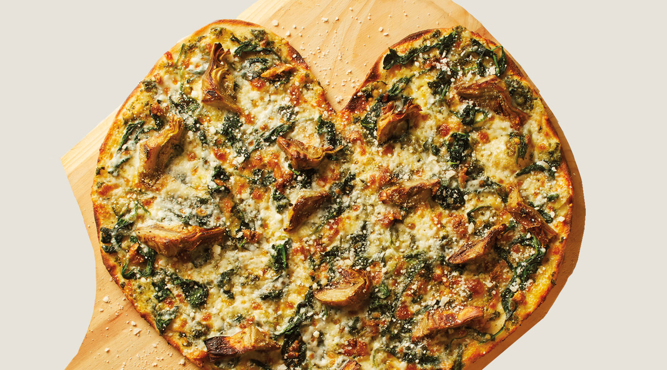 california pizza kitchen makes heart shape pizza pie for mother's day