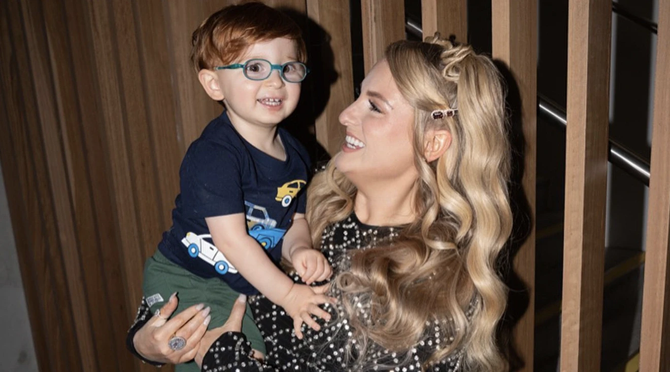 pregnant meghan trainor and son riley smiling 