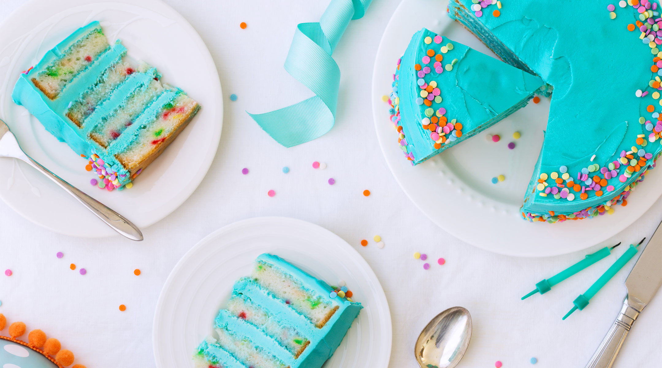 blue cake and confetti