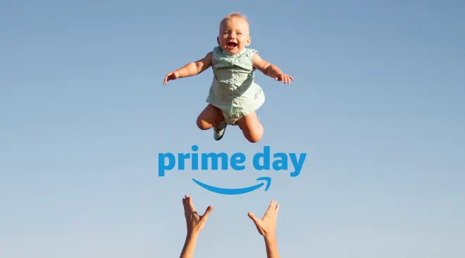 man throwing baby in air with amazon prime day logo