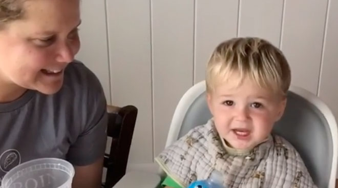 video still of Amy Schumer's son saying dad for the first time.