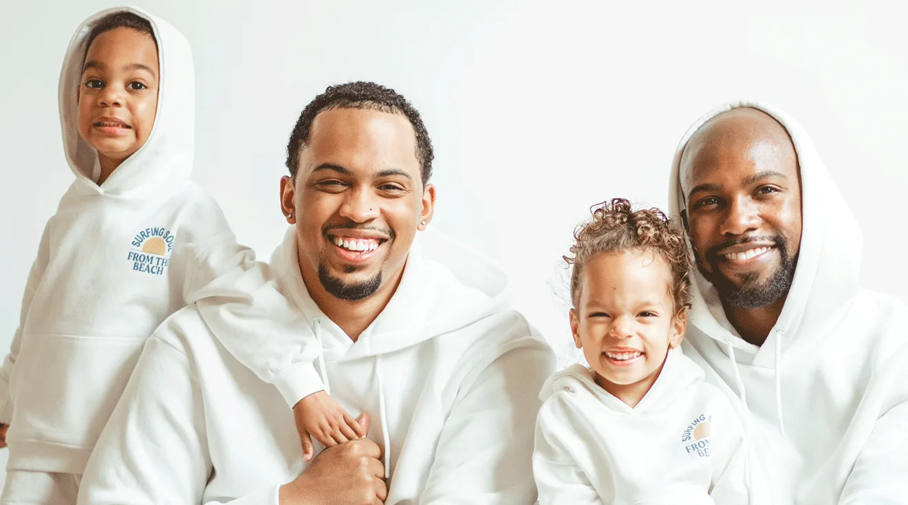 Terrell and Jarius Joseph smiling with their children