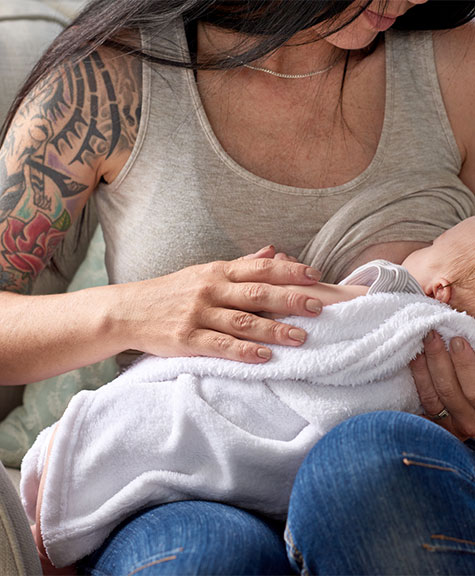 Baby biting while shops nursing