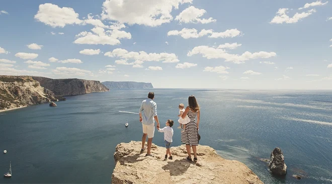 family of four hiking and traveling the world