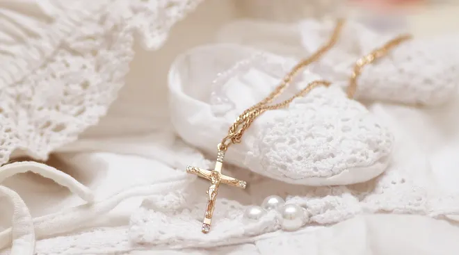 baby baptism shoes and gold cross necklace