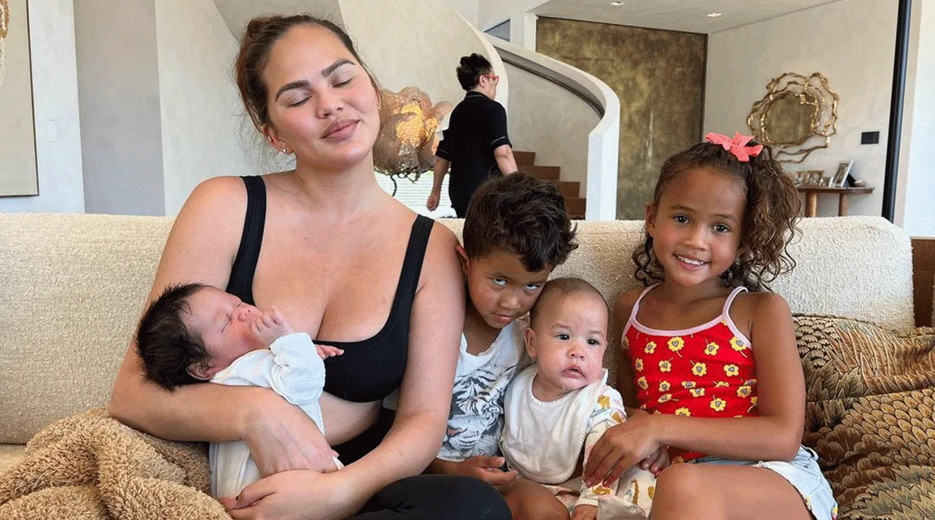 chrissy teigen at home with her 4 children