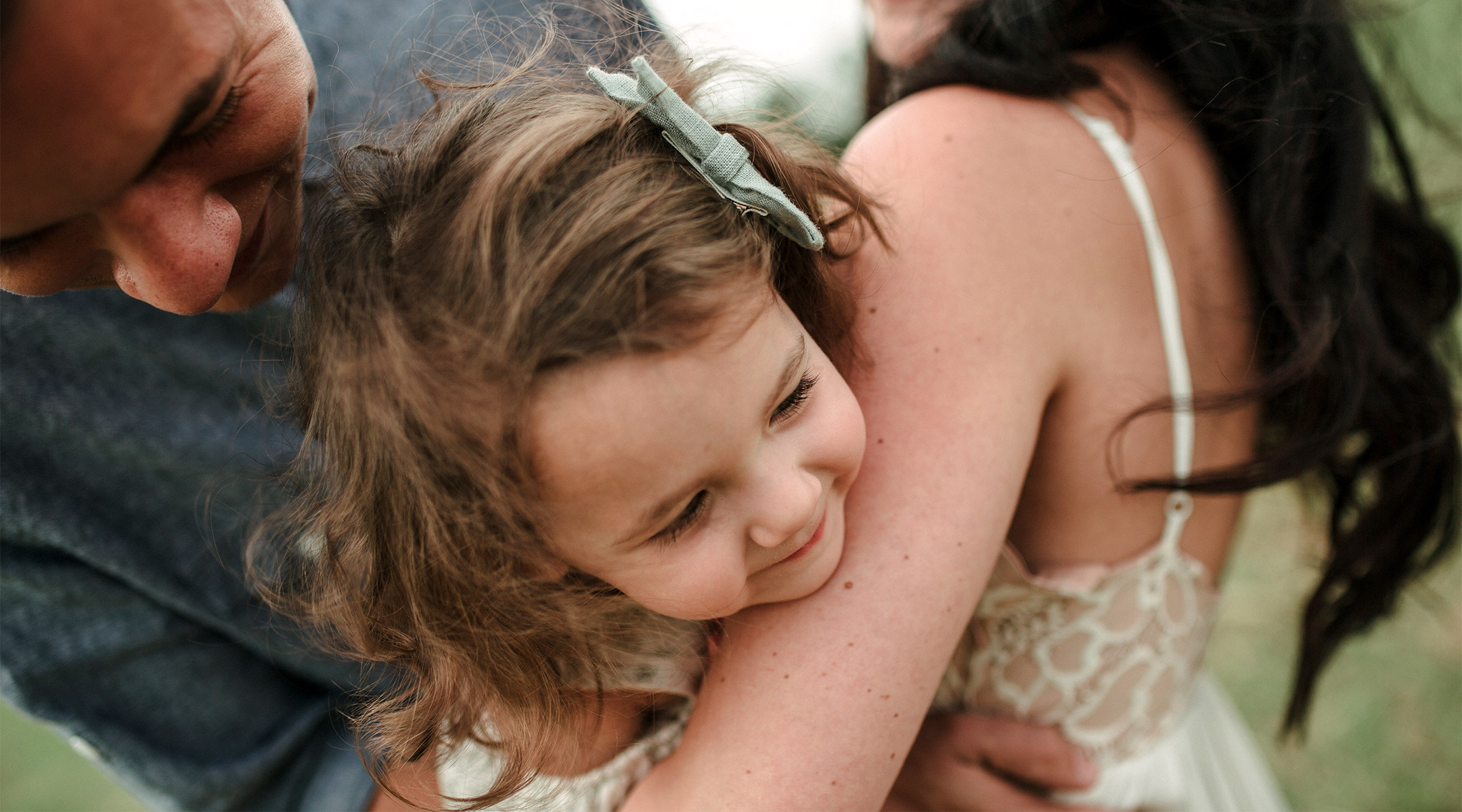 parents having fun playing with toddler